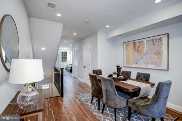 Dining area and main-level hallway