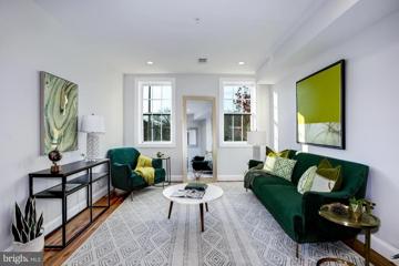 Living room with tall windows