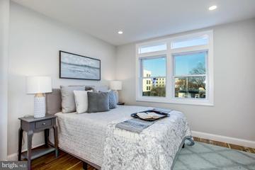 Bedroom with large windows